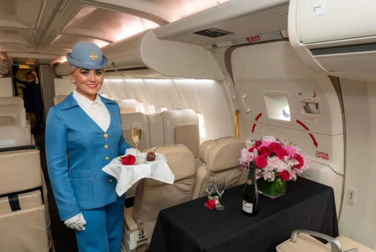 Flight attendant in classic Pan Am uniform